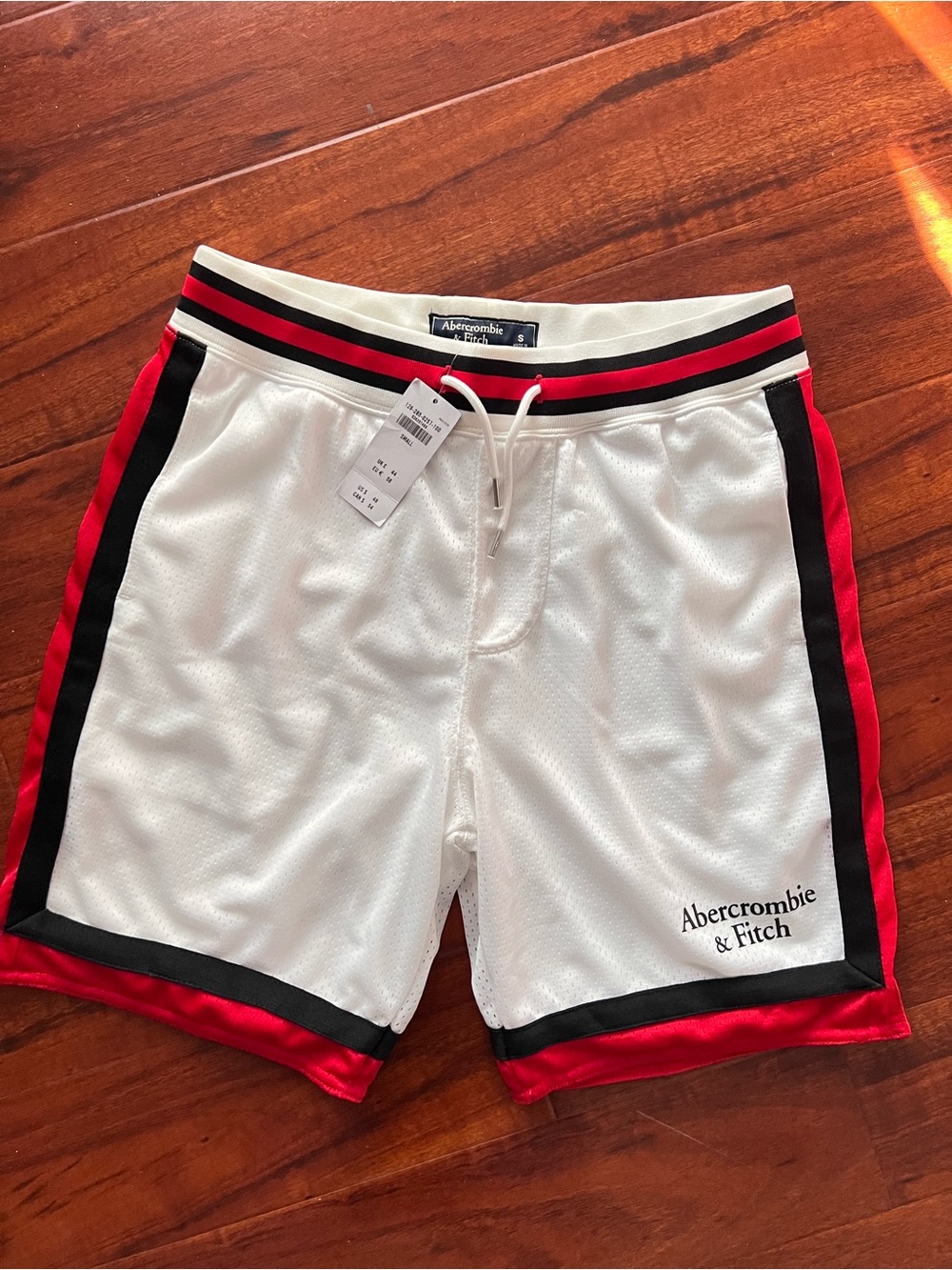 Abercrombie & Fitch White Mesh Shorts with Red and Black Waistband